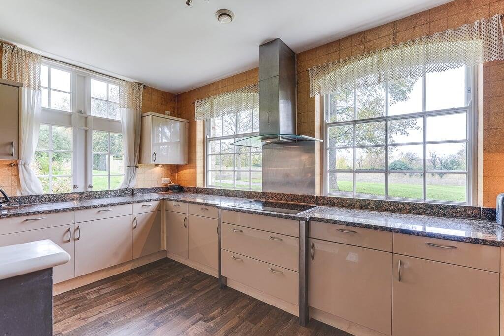 A Grade II listed Bedfordshire home where a tenant murdered his landlady is for sale at £550,000, blending period charm with a chilling past and striking modern design.