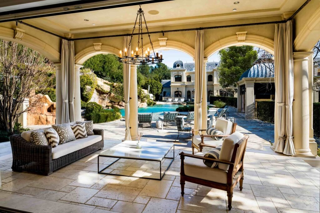 Paris Hilton buys Mark Wahlberg’s \$63m Beverly Park mansion with 12 bedrooms, pro gym, golf course, and top-tier privacy after losing her last home in LA fires.