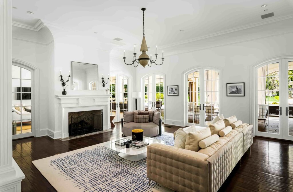 Paris Hilton buys Mark Wahlberg’s \$63m Beverly Park mansion with 12 bedrooms, pro gym, golf course, and top-tier privacy after losing her last home in LA fires.