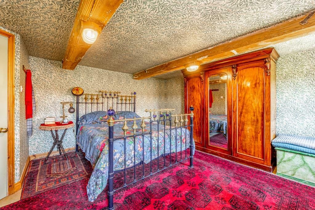 Historic Maud Foster Windmill in Lincolnshire is for sale at £549,950 with a penthouse home, shop, flour mill, and potential for a wedding venue or holiday let.