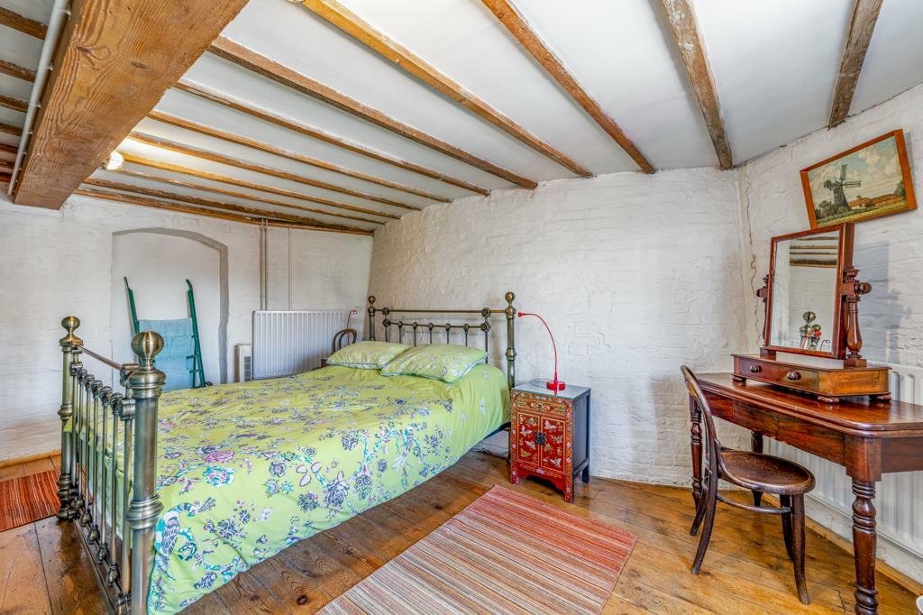 Historic Maud Foster Windmill in Lincolnshire is for sale at £549,950 with a penthouse home, shop, flour mill, and potential for a wedding venue or holiday let.
