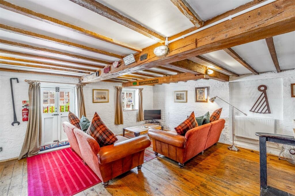Historic Maud Foster Windmill in Lincolnshire is for sale at £549,950 with a penthouse home, shop, flour mill, and potential for a wedding venue or holiday let.