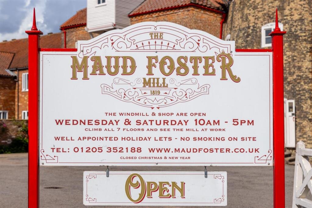 Historic Maud Foster Windmill in Lincolnshire is for sale at £549,950 with a penthouse home, shop, flour mill, and potential for a wedding venue or holiday let.