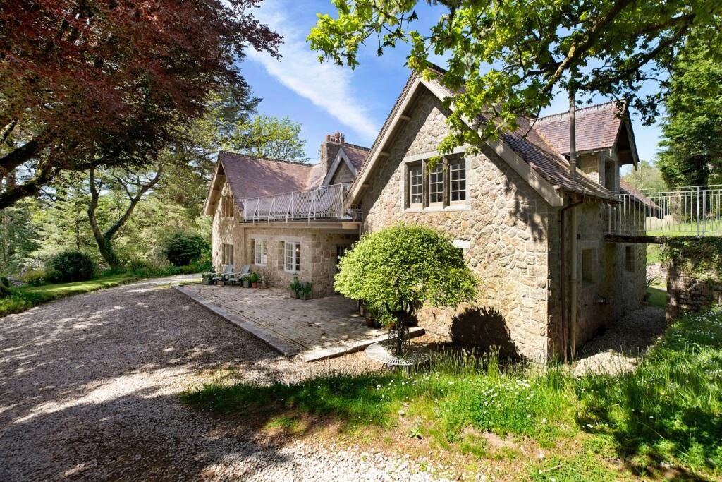 Former King Charles country home Brimptsmead Estate in Dartmoor is for sale at £4.5m, featuring 6 bedrooms, 2 cottages, 9 acres, and royal fishing rights.