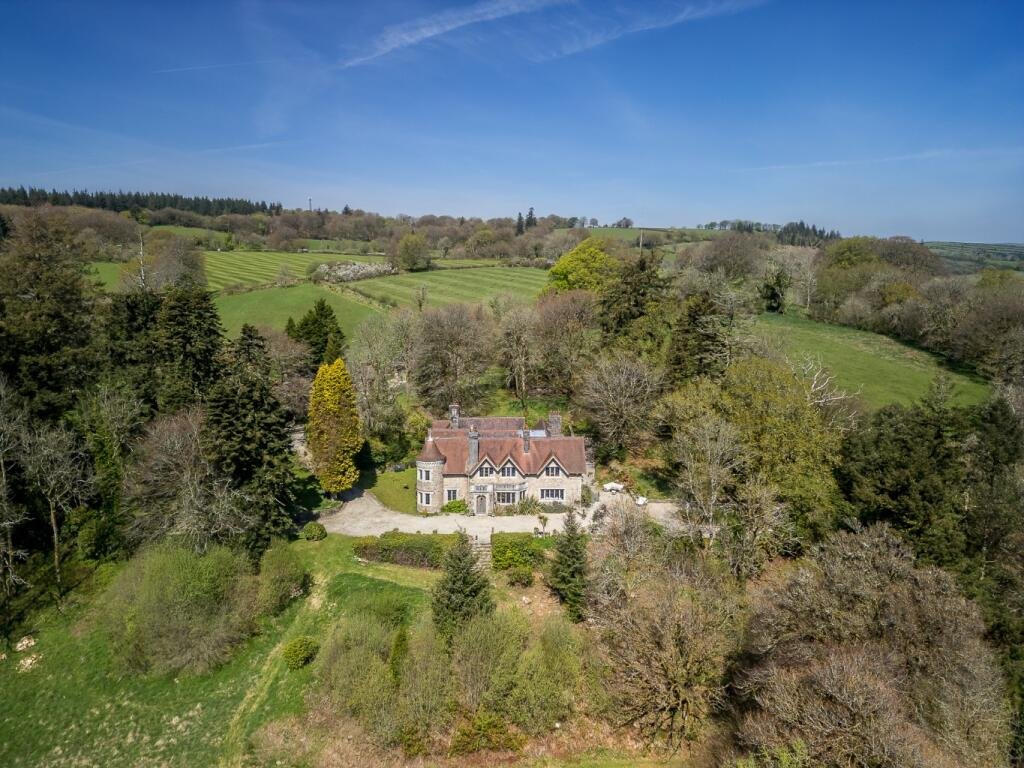 Former King Charles country home Brimptsmead Estate in Dartmoor is for sale at £4.5m, featuring 6 bedrooms, 2 cottages, 9 acres, and royal fishing rights.