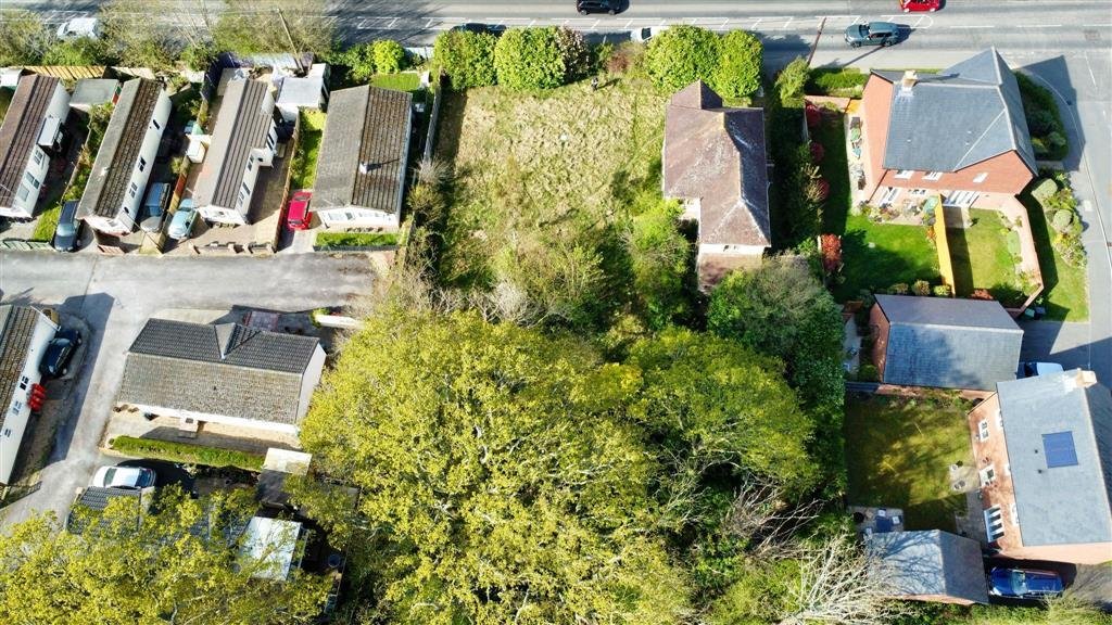 A £450,000 Winchester home with boarded windows, blackened walls and renovation needs is up for auction, with buyers advised to bring a torch and wear sturdy shoes.