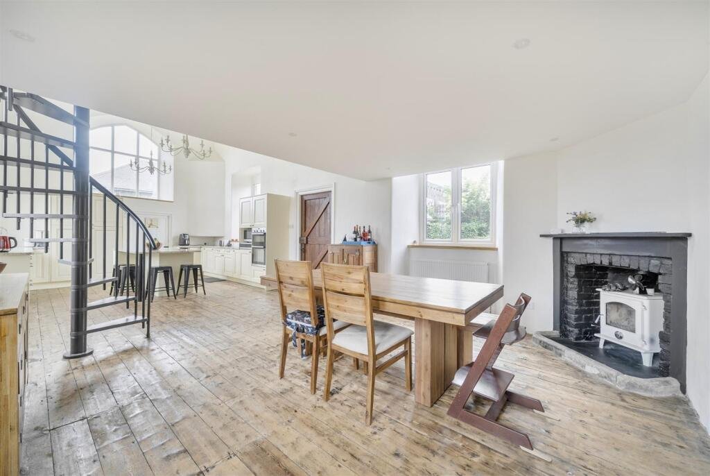 A restored 1876 schoolhouse in Devon with church views and a graveyard garden hits the market for £525,000, offering charm, history, and countryside tranquility.