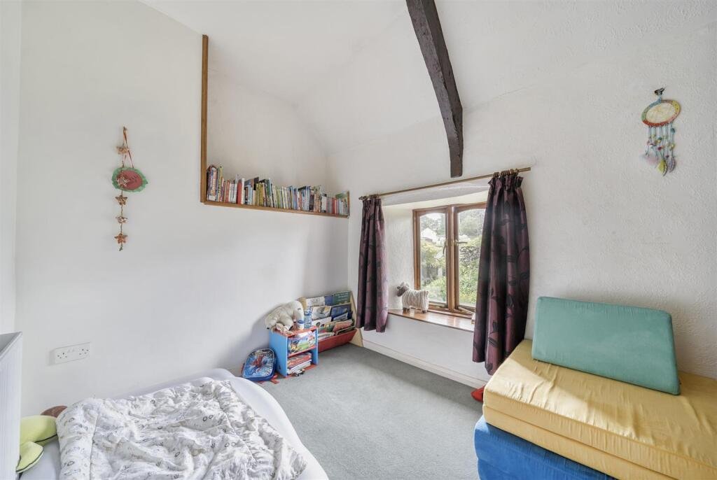 A restored 1876 schoolhouse in Devon with church views and a graveyard garden hits the market for £525,000, offering charm, history, and countryside tranquility.
