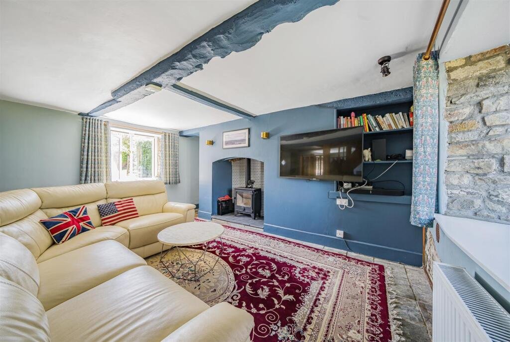 A restored 1876 schoolhouse in Devon with church views and a graveyard garden hits the market for £525,000, offering charm, history, and countryside tranquility.