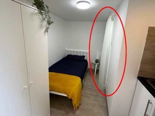 A £750-a-month Canning Town studio with no windows and a curtain for a bathroom door offers minimal space, limited kitchen facilities, and all bills included in rent.
