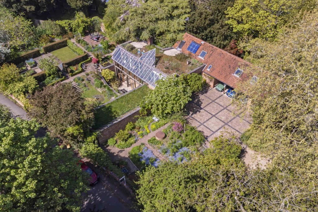 The Garden House, a £1.5m six-bedroom eco-home in Notts, blends 1790s charm with modern design, solar tech, garden views, and family-friendly living near top schools.