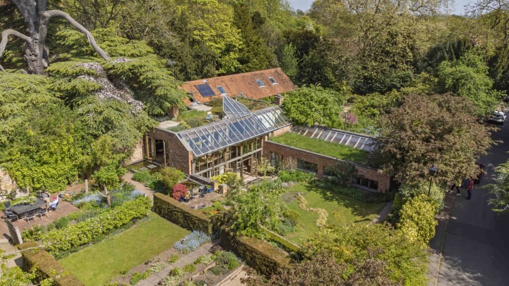 The Garden House, a £1.5m six-bedroom eco-home in Notts, blends 1790s charm with modern design, solar tech, garden views, and family-friendly living near top schools.