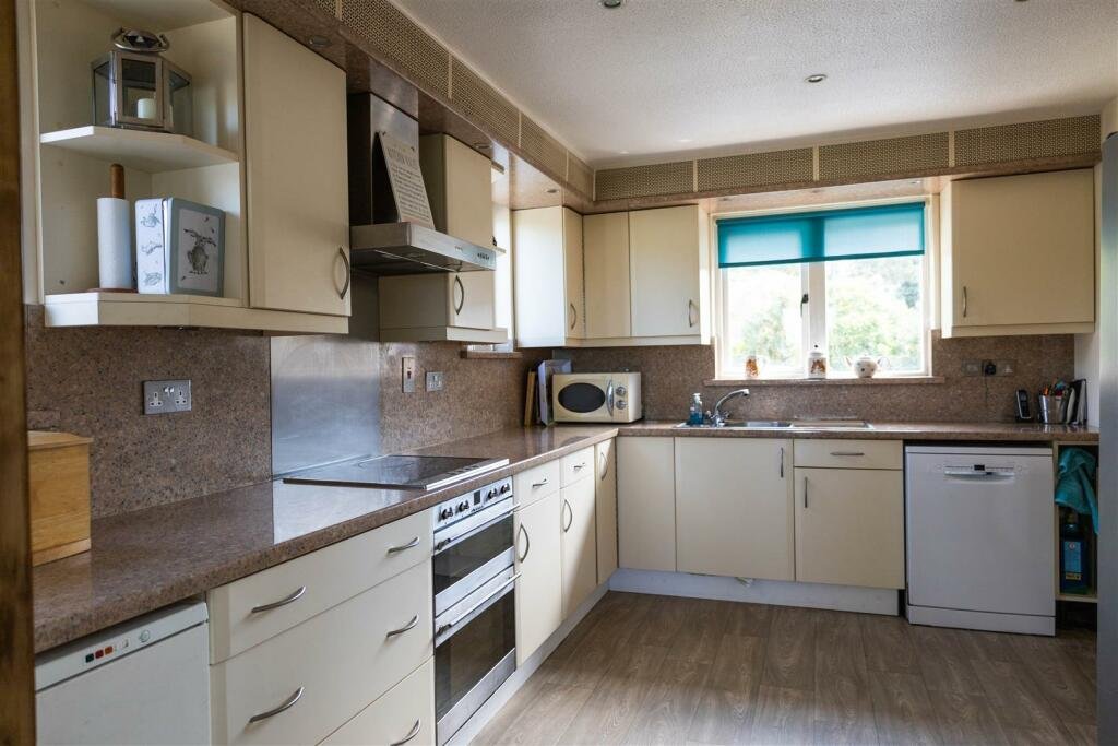 Four bedroom home in Chulmleigh Devon with 18 hole golf course clubhouse function room and stunning Taw Valley views on sale for £850000 offering a rare lifestyle opportunity.