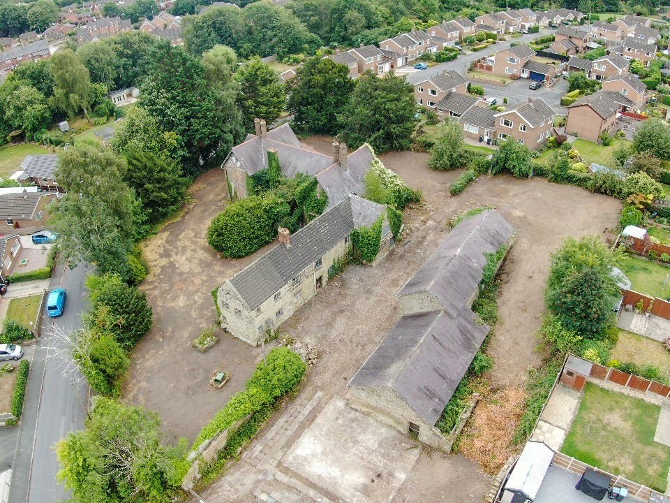 A 500 year old Grade II listed house in Ruabon near Wrexham is up for auction at £120000 offering historic charm and development potential but needing major restoration.