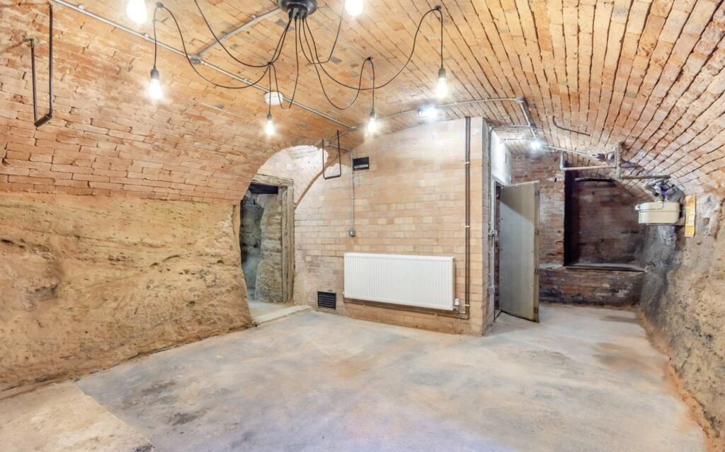 Historic Nottingham home once owned by Lord Byron listed for £850,000 with four bedrooms, modern interiors, courtyard garden and a network of caves beneath.