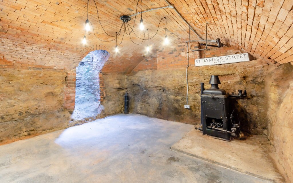 Historic Nottingham home once owned by Lord Byron listed for £850,000 with four bedrooms, modern interiors, courtyard garden and a network of caves beneath.