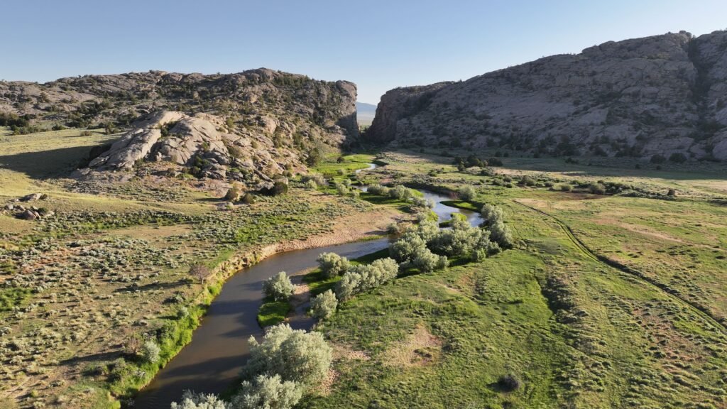 Pathfinder Ranch in Wyoming spans 916000 acres with rivers historic trails cattle operations and a main lodge now listed for \$79.5m offering a rare legacy ownership opportunity.