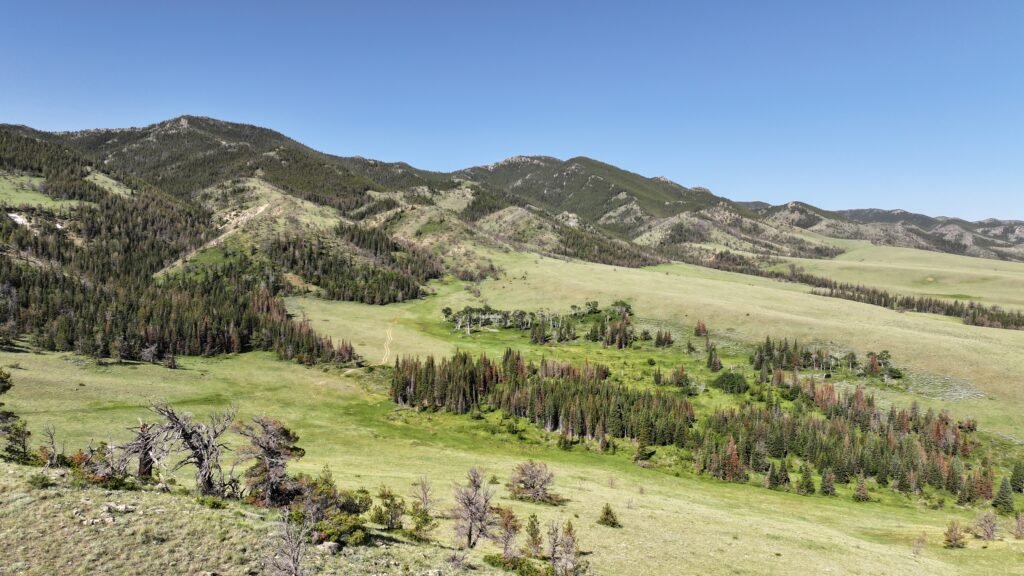 Pathfinder Ranch in Wyoming spans 916000 acres with rivers historic trails cattle operations and a main lodge now listed for \$79.5m offering a rare legacy ownership opportunity.