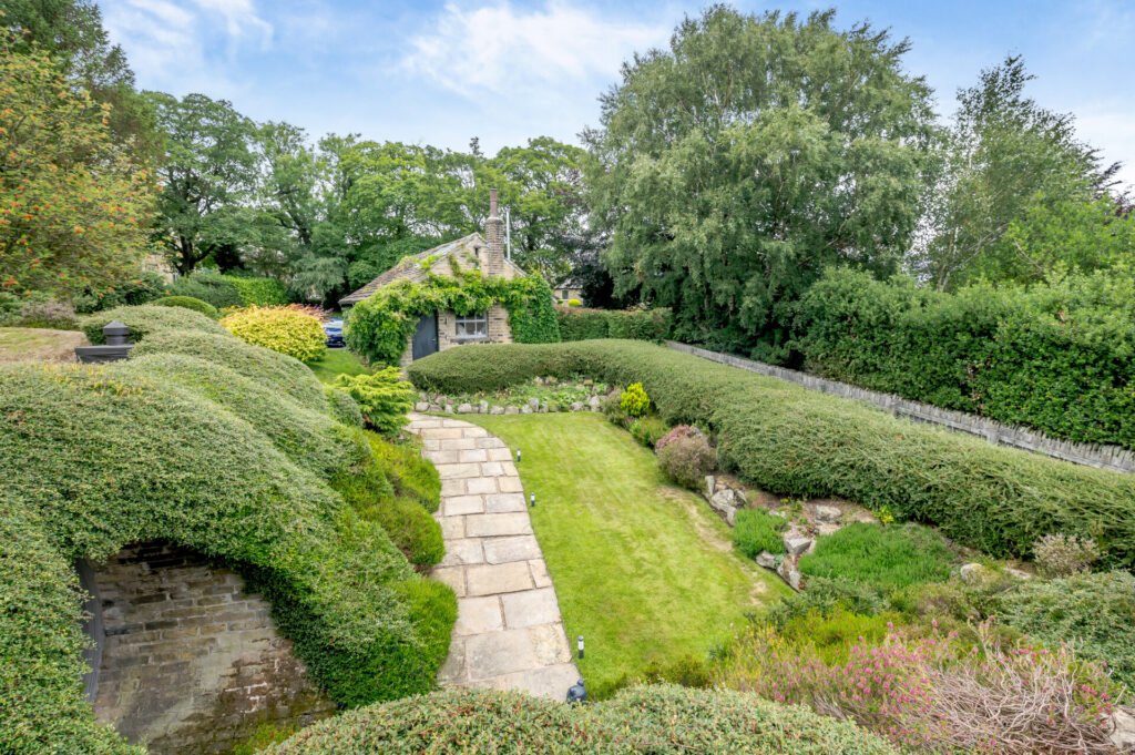 Underhill, Britain’s first modern earth sheltered home, blends Tolkien charm with luxury, featuring a pool, cave snug and breathtaking Peak District countryside views.