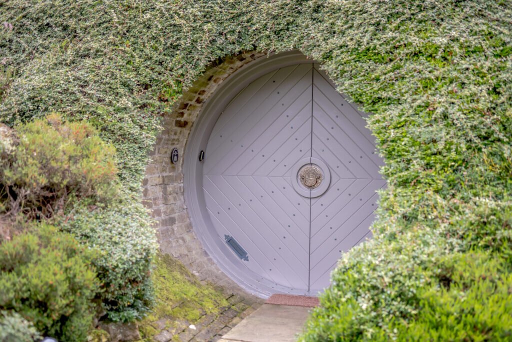 Underhill, Britain’s first modern earth sheltered home, blends Tolkien charm with luxury, featuring a pool, cave snug and breathtaking Peak District countryside views.