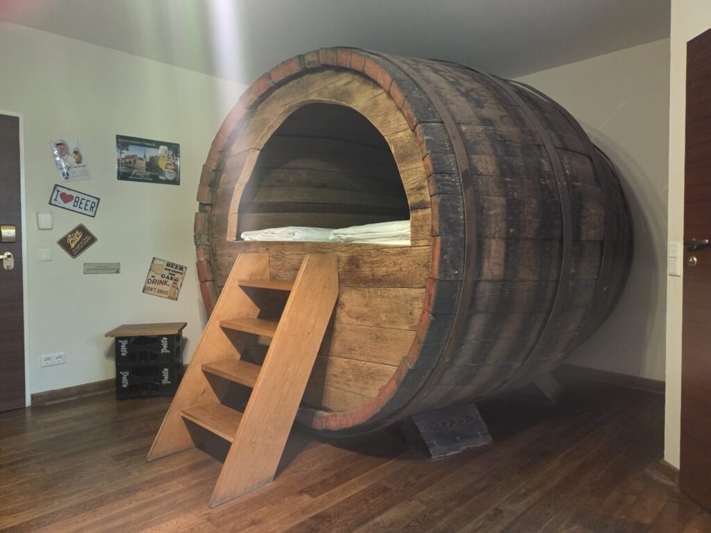A quirky German hotel lets guests sleep inside giant 19th century beer barrels, with cosy beds, modern comforts and beer-themed décor from just £103 per night.