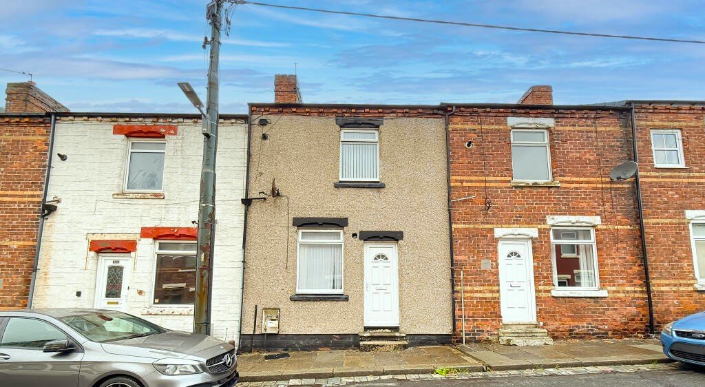 This £5,000 ghost town terrace in Horden, Durham is a loner's dream and a renovator’s project, with two bedrooms, overgrown garden and eerie post-mining charm.