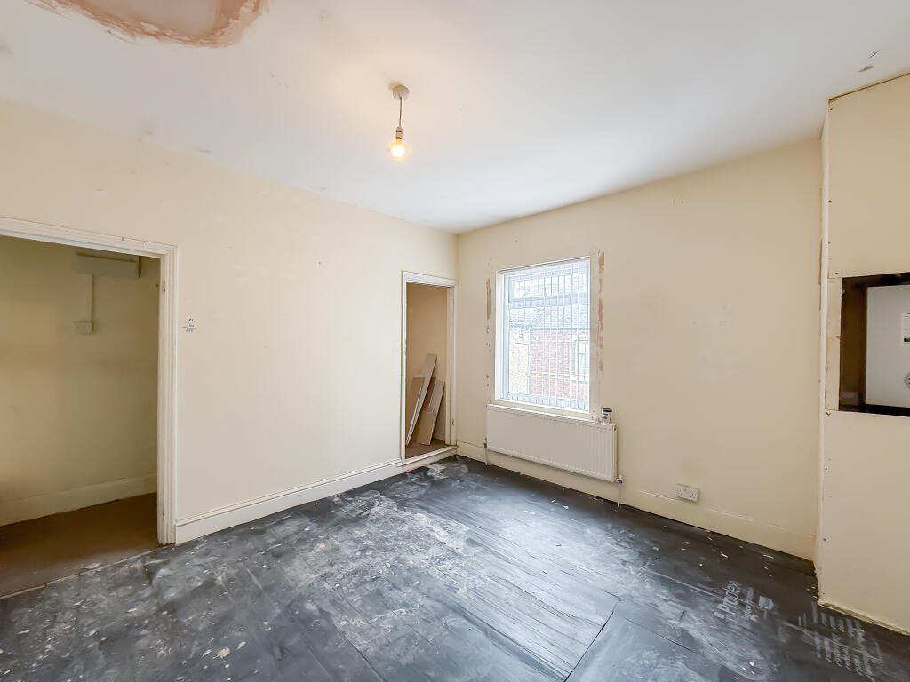 This £5,000 ghost town terrace in Horden, Durham is a loner's dream and a renovator’s project, with two bedrooms, overgrown garden and eerie post-mining charm.