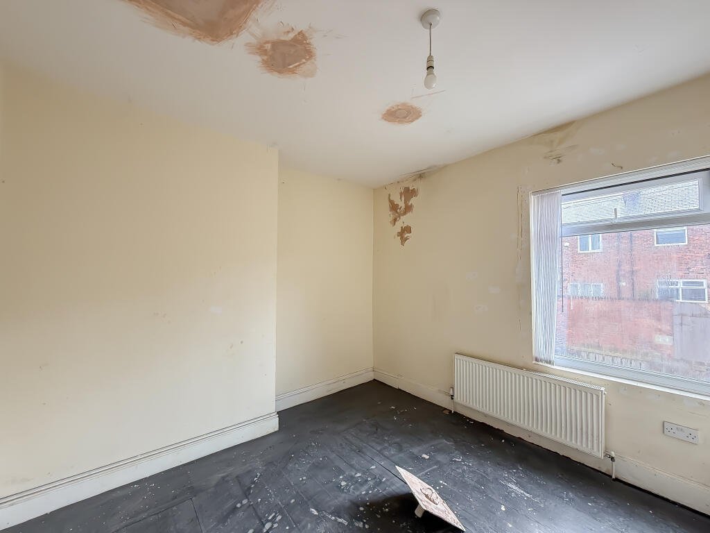 This £5,000 ghost town terrace in Horden, Durham is a loner's dream and a renovator’s project, with two bedrooms, overgrown garden and eerie post-mining charm.