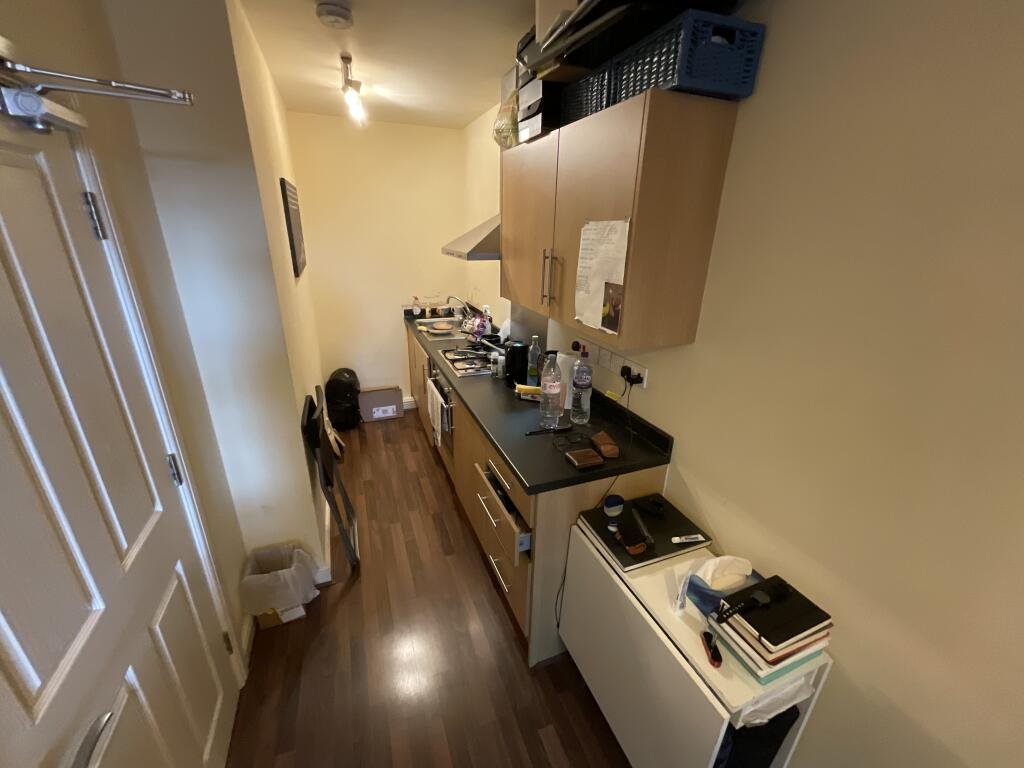 A £60,000 Sheffield studio dubbed a hallway hits the market with just 21 square meters of space, a floor mattress office setup and strong rental yield for investors.