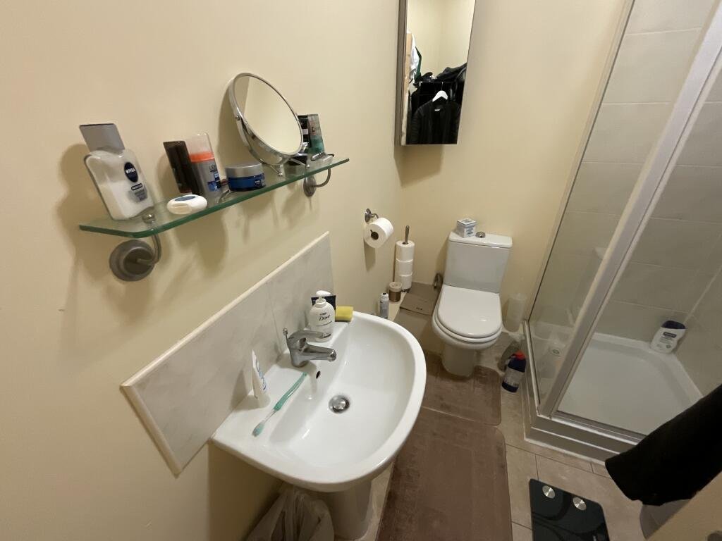 A £60,000 Sheffield studio dubbed a hallway hits the market with just 21 square meters of space, a floor mattress office setup and strong rental yield for investors.