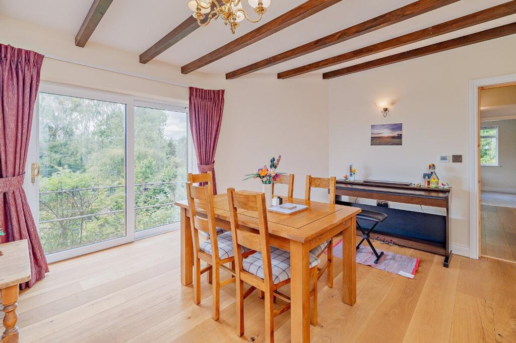 Secluded £520k woodland home in Shrewsbury with two bedrooms nearly one acre of gardens rare plants historic mine features and stunning views offers ultimate privacy.