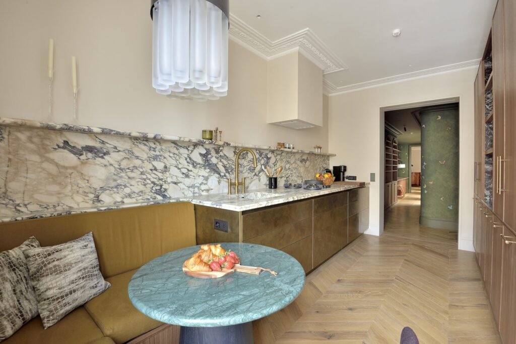 A €5.2m Paris apartment opposite Café de Flore offers 149m² of luxury with floor-to-ceiling windows, chic interiors, a showpiece kitchen and postcard-perfect views.