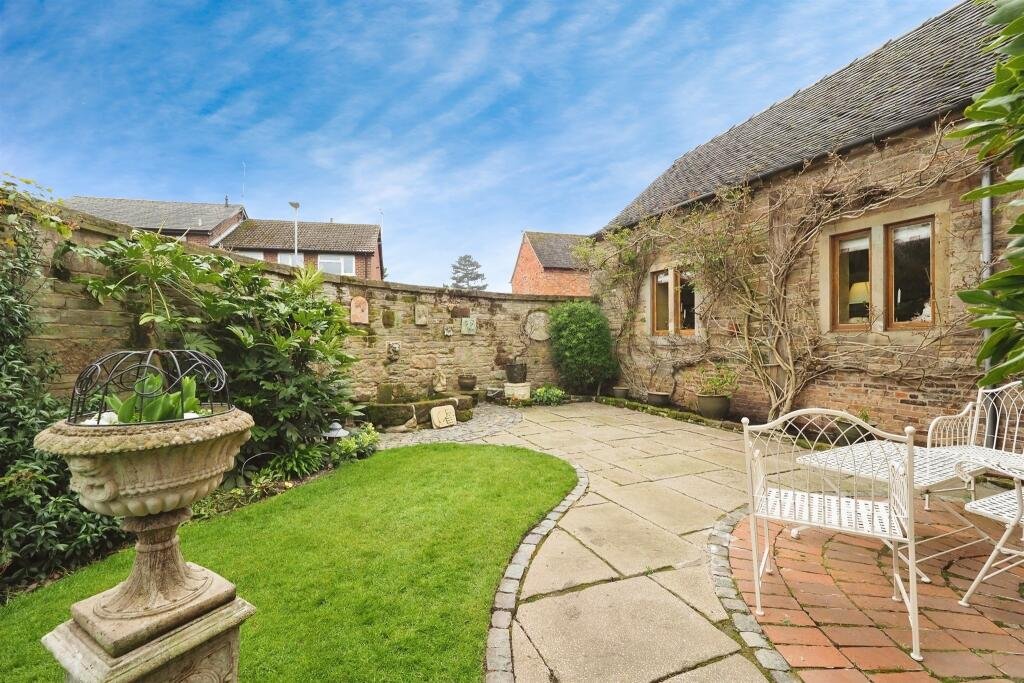 Family home in Hemington for £840,000 features modern comforts plus rare ruins of a 13th century Grade II listed chapel, a secret garden and a refurbished stone barn.