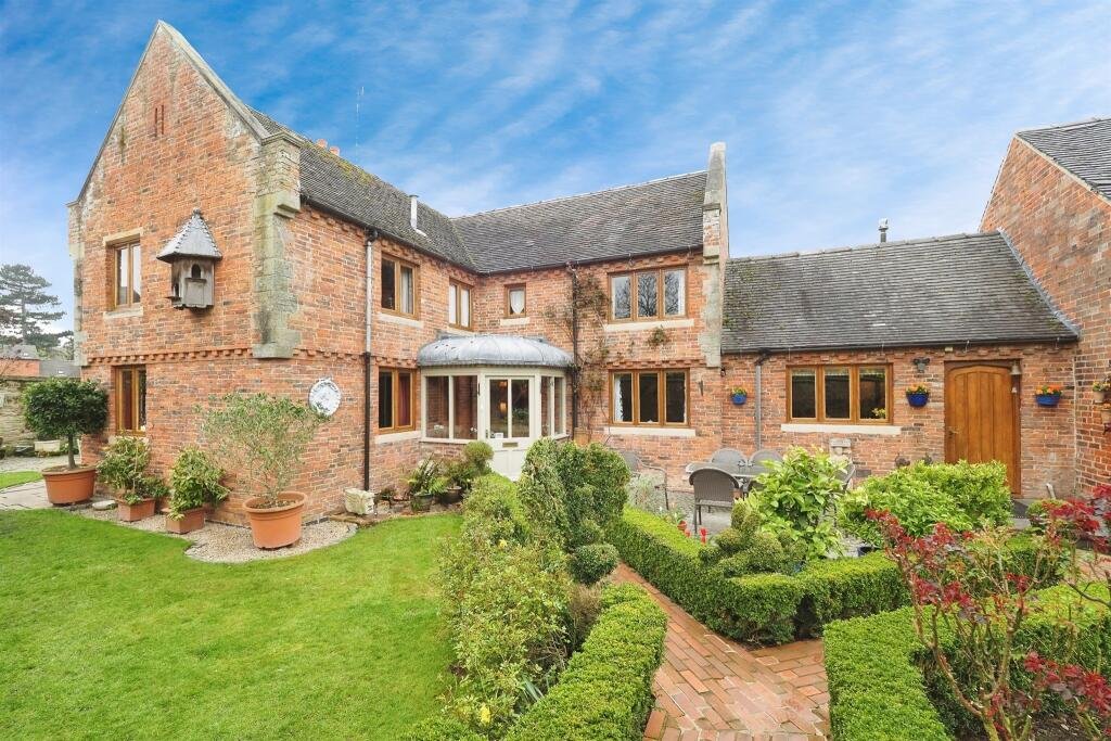 Family home in Hemington for £840,000 features modern comforts plus rare ruins of a 13th century Grade II listed chapel, a secret garden and a refurbished stone barn.