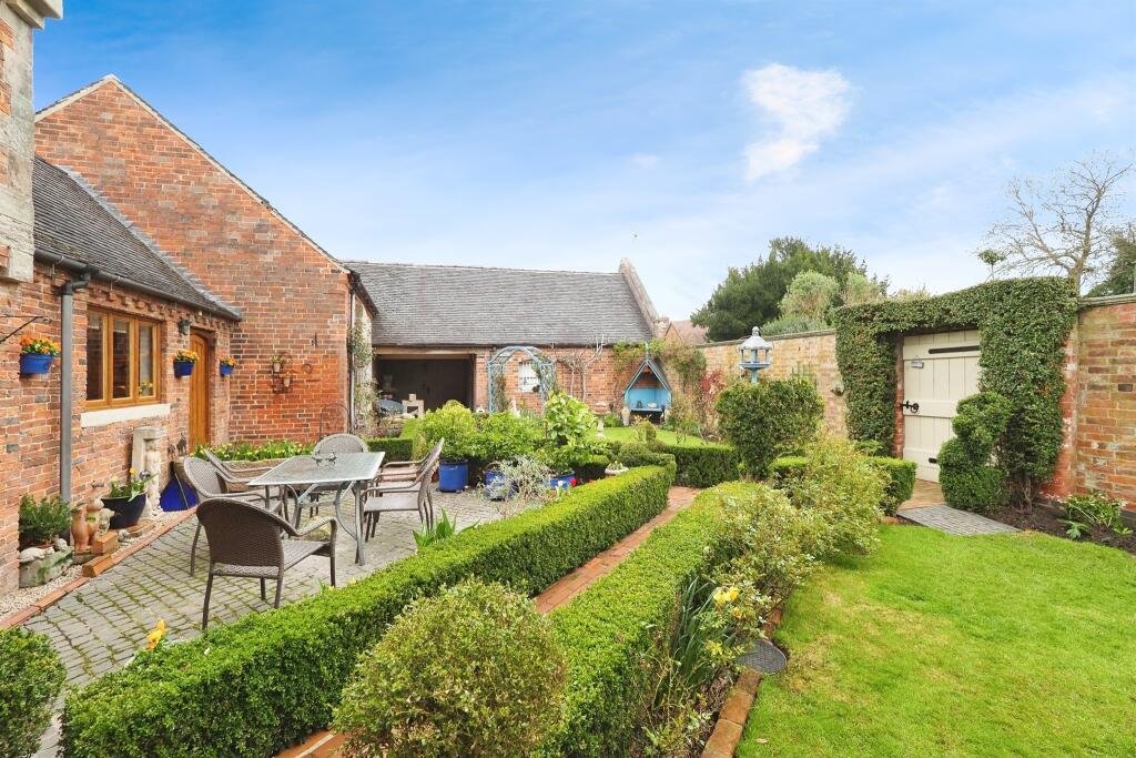 Family home in Hemington for £840,000 features modern comforts plus rare ruins of a 13th century Grade II listed chapel, a secret garden and a refurbished stone barn.