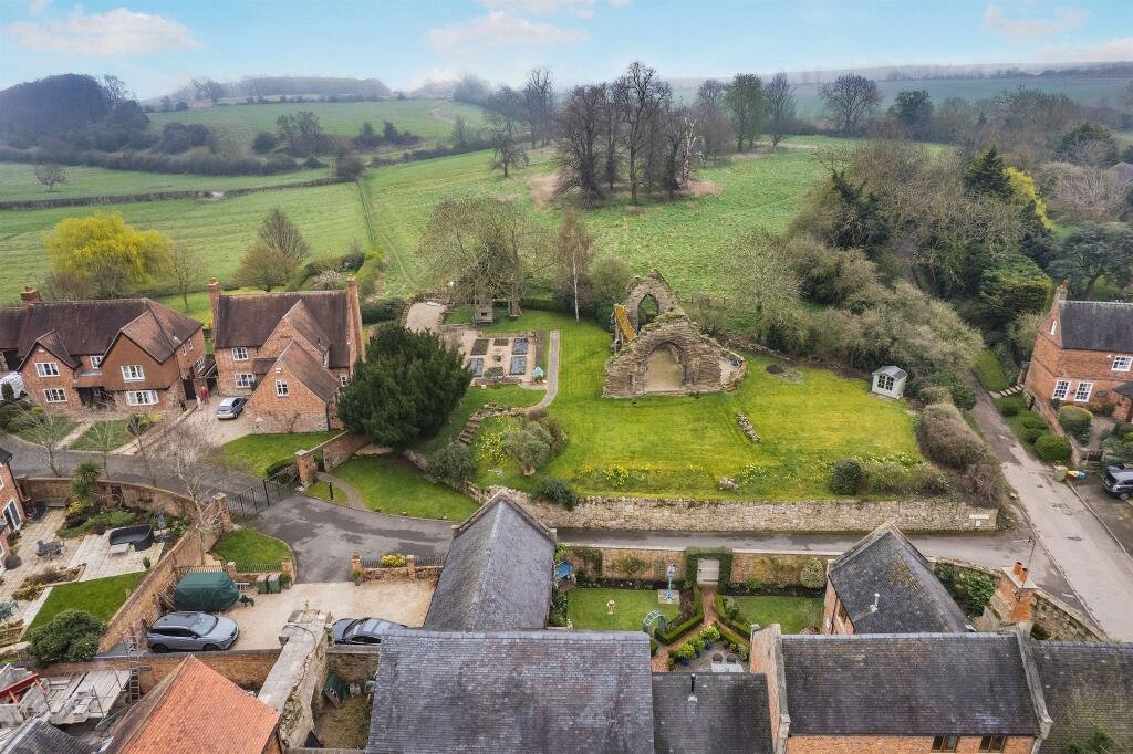 Family home in Hemington for £840,000 features modern comforts plus rare ruins of a 13th century Grade II listed chapel, a secret garden and a refurbished stone barn.