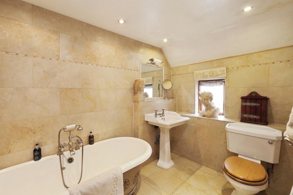 Family home in Hemington for £840,000 features modern comforts plus rare ruins of a 13th century Grade II listed chapel, a secret garden and a refurbished stone barn.