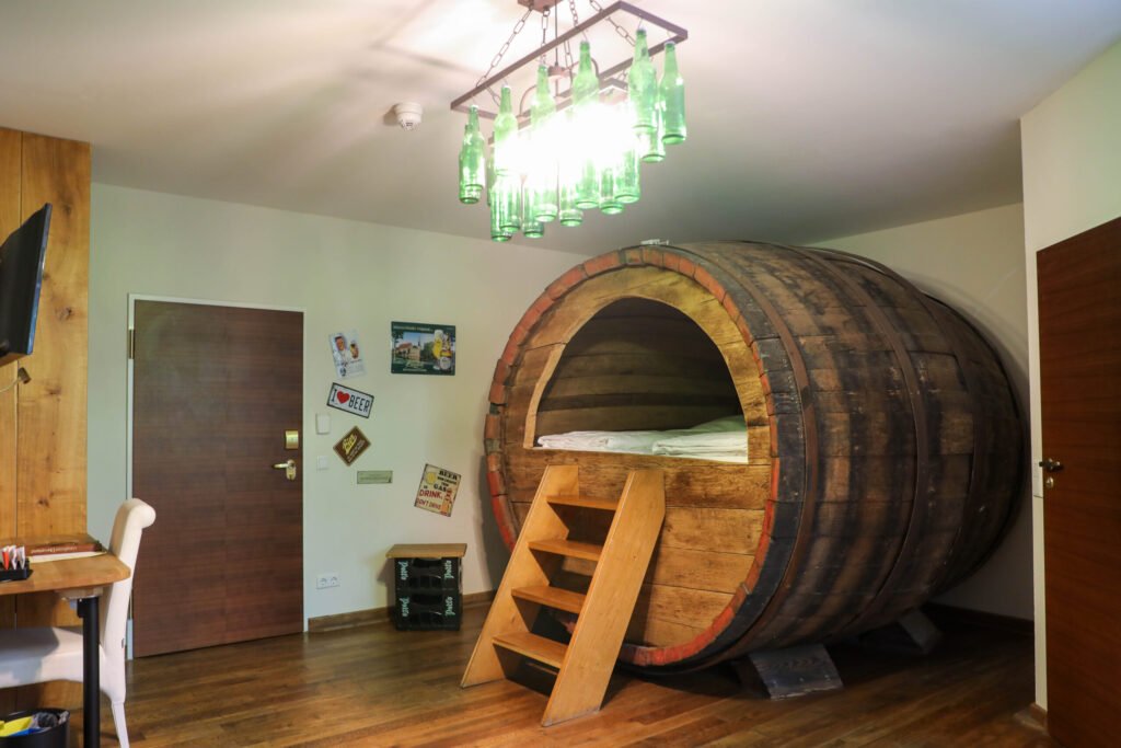 A quirky German hotel lets guests sleep inside giant 19th century beer barrels, with cosy beds, modern comforts and beer-themed décor from just £103 per night.