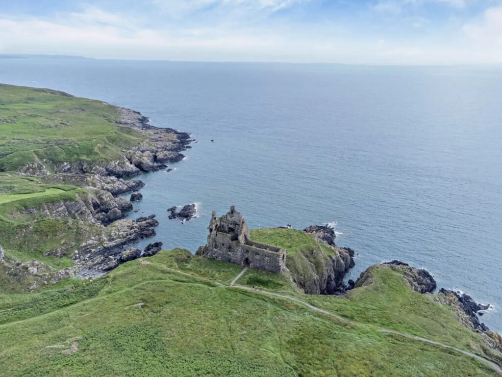 Dunskey Castle ruins on a cliff in Scotland with sea views to Northern Ireland are on sale for offers over £100,000 offering eight acres of land and historic allure.