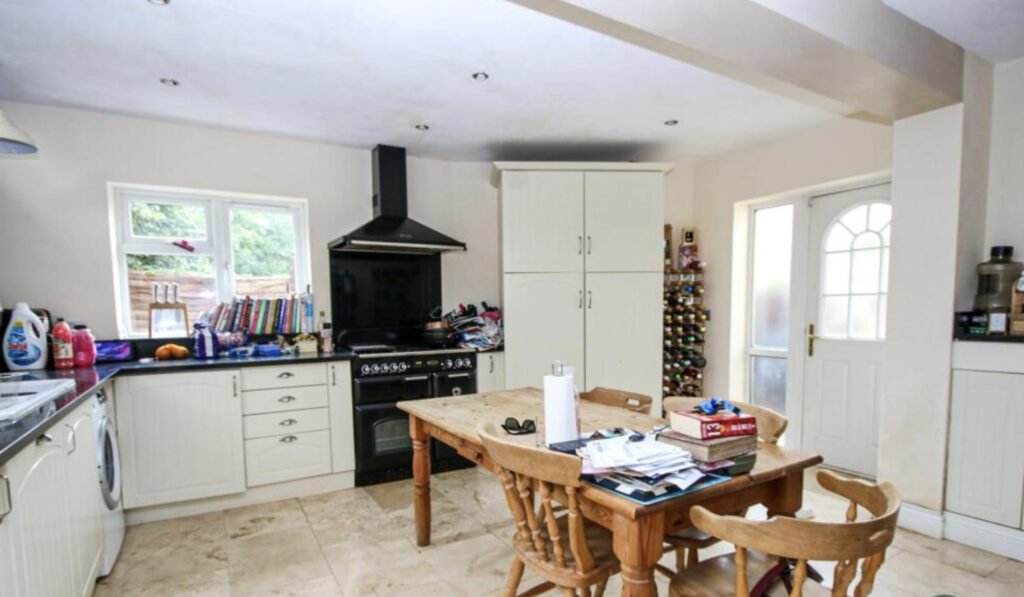 Four bedroom Norwich home listed for £435,000 hides a quirky surprise in the kitchen - a bright blue Tardis replica offering unique character alongside family living.
