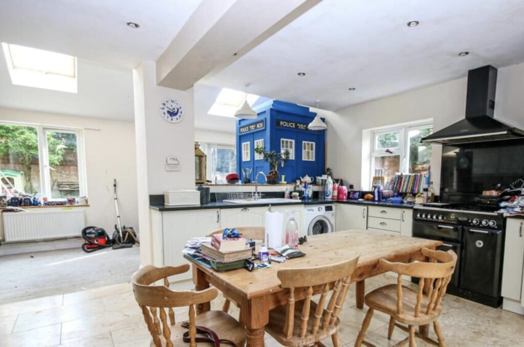 Four bedroom Norwich home listed for £435,000 hides a quirky surprise in the kitchen - a bright blue Tardis replica offering unique character alongside family living.