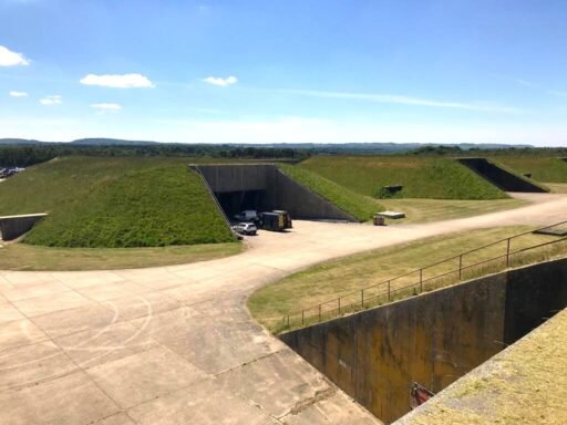 Six Cold War nuclear bunkers at RAF Greenham Common are up for sale, resembling the Teletubbies home, with blast doors, tunnels, and a history tied to film and music.