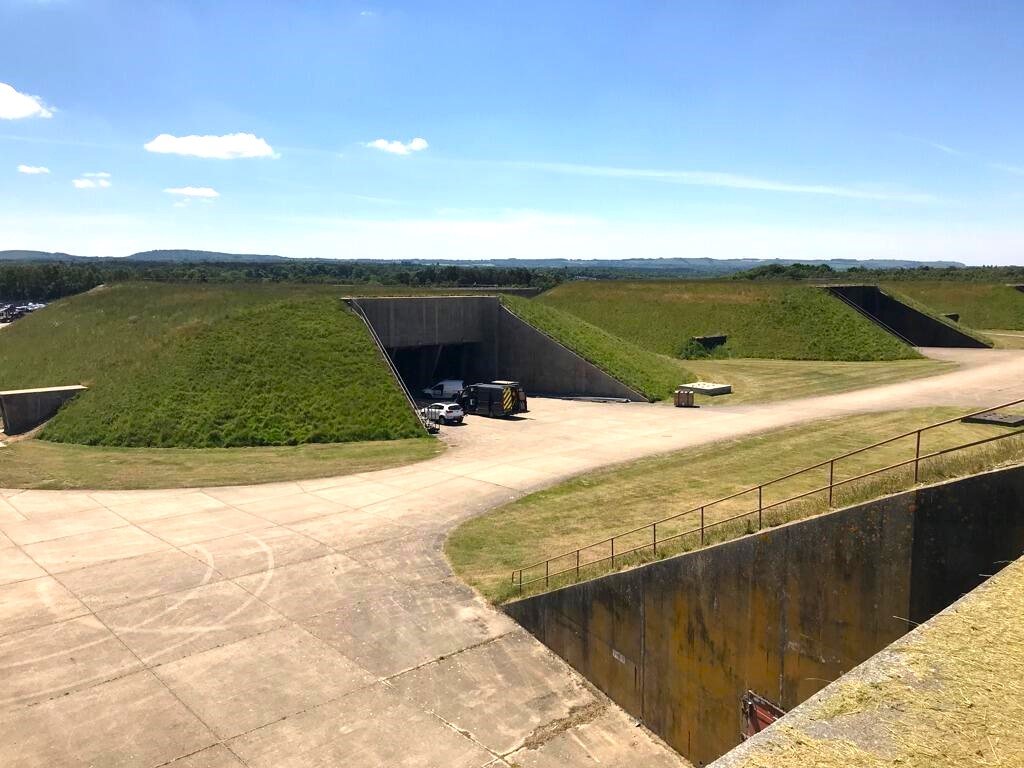 Six Cold War nuclear bunkers at RAF Greenham Common are up for sale, resembling the Teletubbies home, with blast doors, tunnels, and a history tied to film and music.