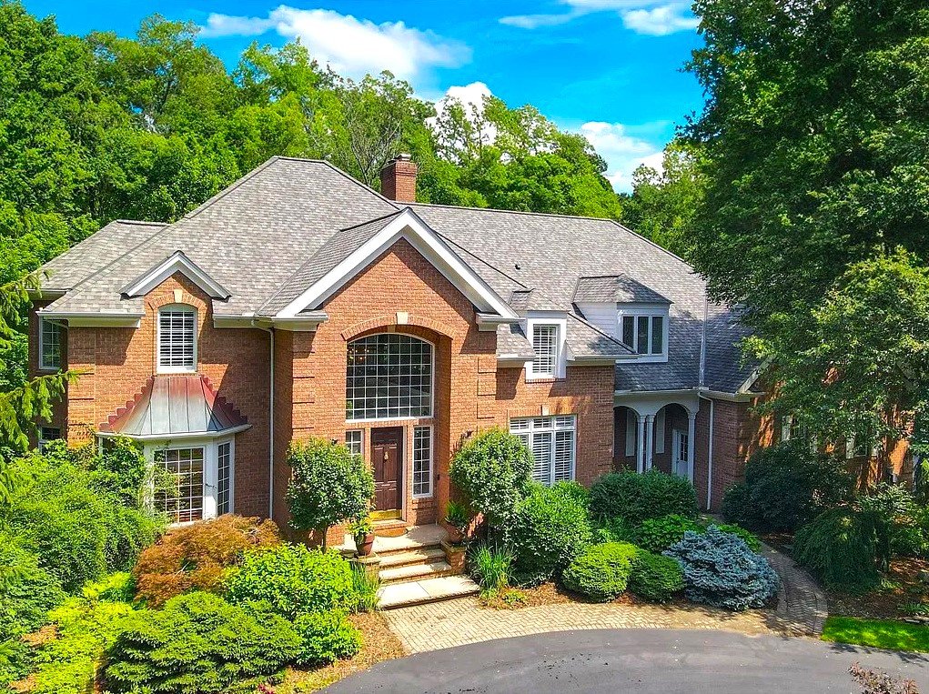 A Cleveland home listed at \$1.6m comes with its own Irish pub, featuring a bar, fireplace and pool table, alongside four bedrooms, marble floors and scenic gardens.