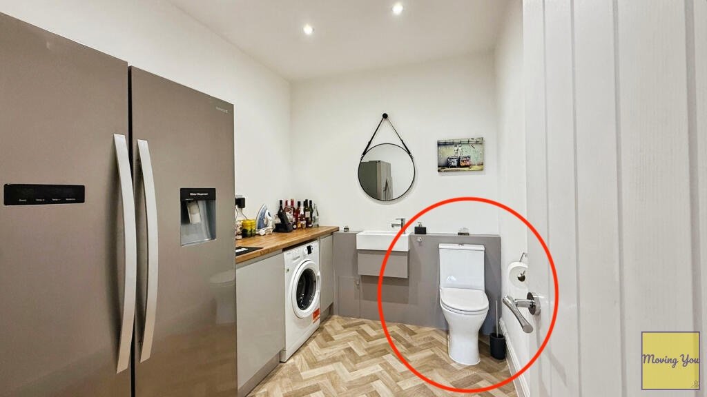 Odd property listing in Bristol shocks buyers with a toilet in a kitchen utility room. The £400k three bed home mixes cooking appliances with a WC leaving viewers baffled.