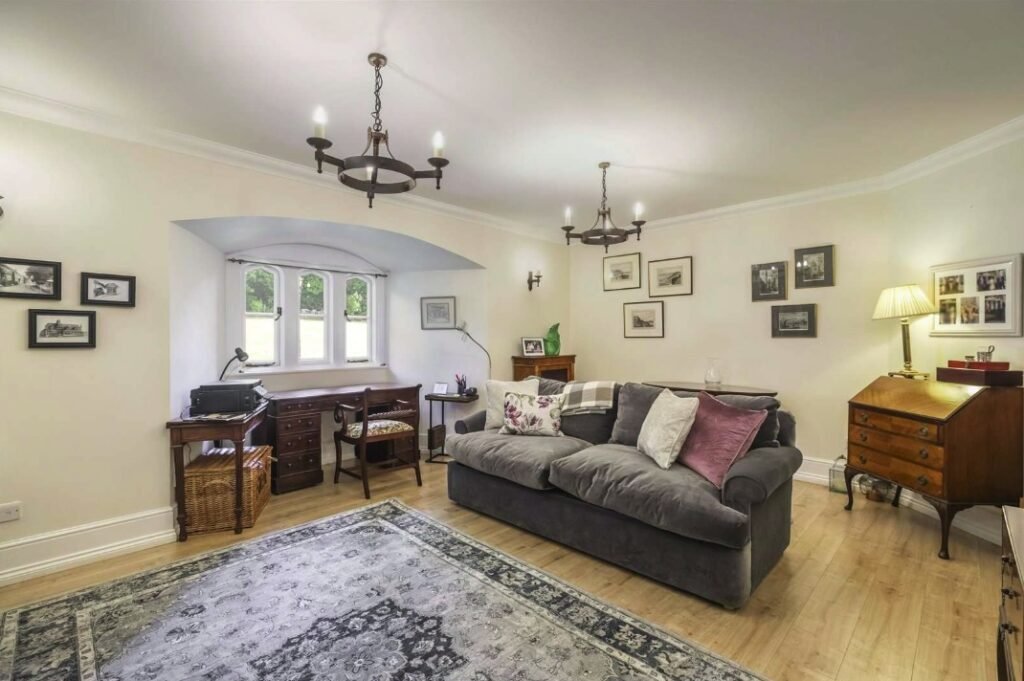 Luxury three bed apartment in Henry VIII’s historic Netley Castle with private beach, sea views, grand hall access, and modern interiors is listed for £800,000.