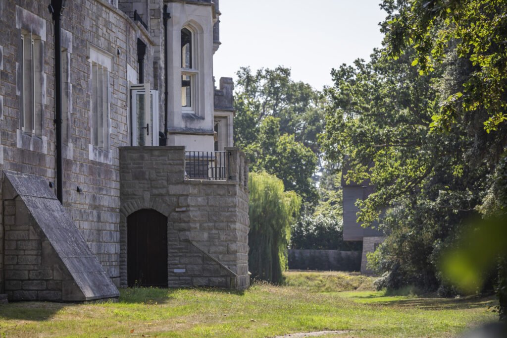 Luxury three bed apartment in Henry VIII’s historic Netley Castle with private beach, sea views, grand hall access, and modern interiors is listed for £800,000.