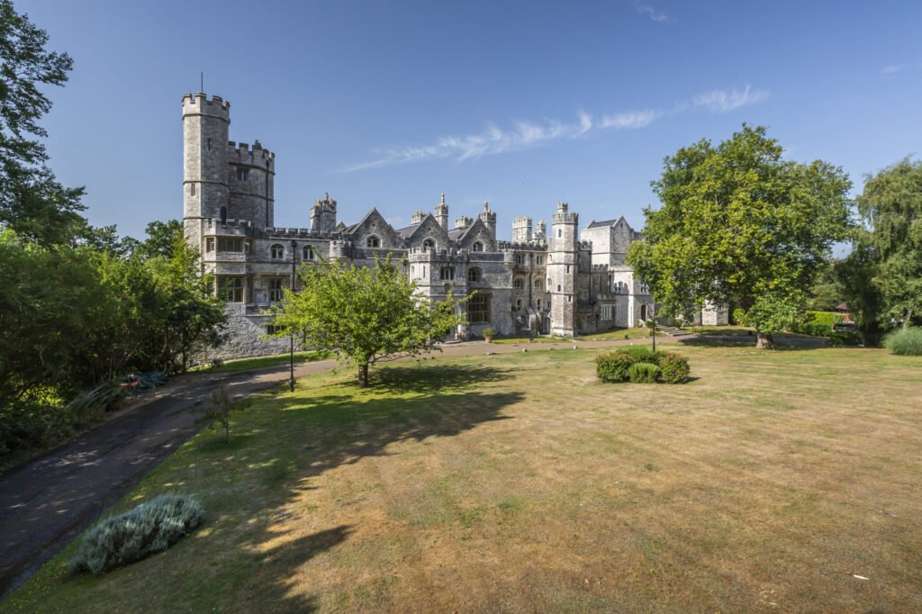 Luxury three bed apartment in Henry VIII’s historic Netley Castle with private beach, sea views, grand hall access, and modern interiors is listed for £800,000.