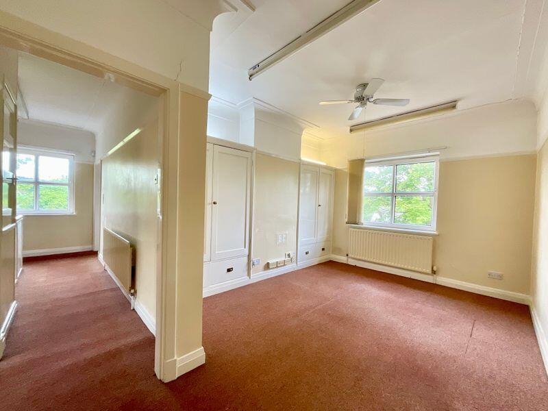 Quirky former police station in Stoke-on-Trent with original cells and steel doors for sale at £335,000. Ideal for family home, flats or redevelopment with no chain.