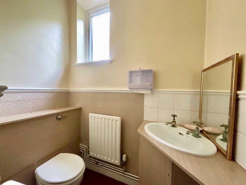 Quirky former police station in Stoke-on-Trent with original cells and steel doors for sale at £335,000. Ideal for family home, flats or redevelopment with no chain.